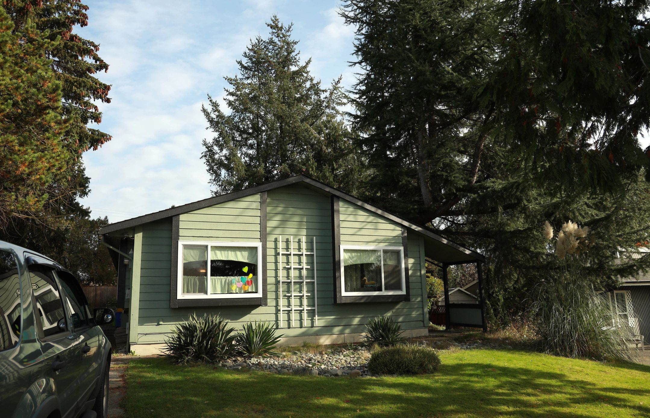 Residential home exterior with siding and trim areas that may require repair